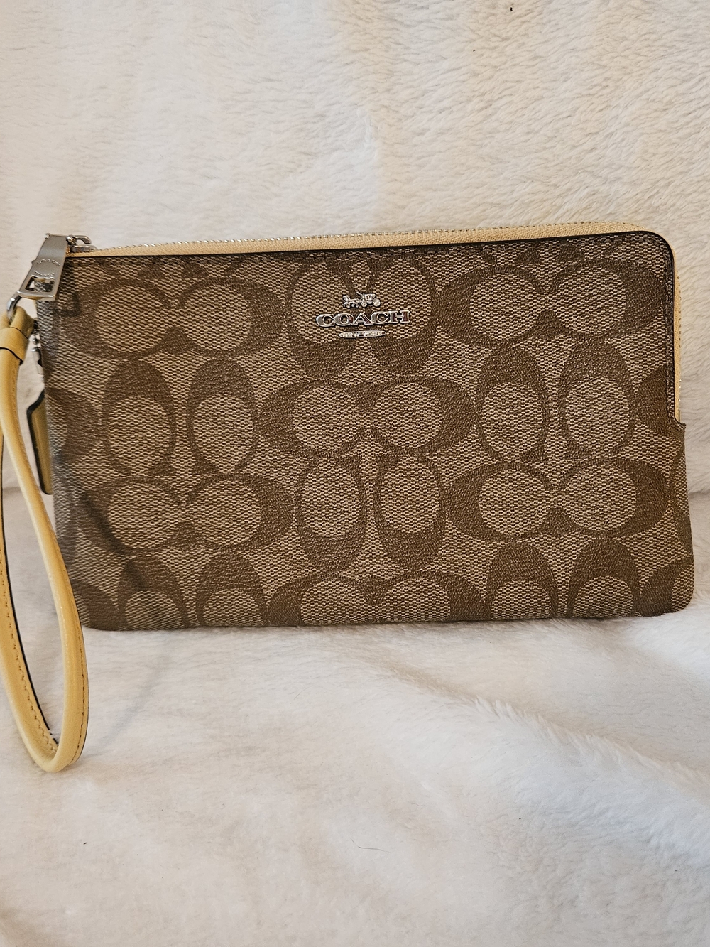 COACH Brown Signature Canvas Wristlet with Yellow Strap